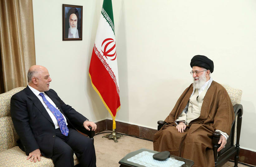 Iran's Supreme Leader Ayatollah Ali Khamenei meets with Iraqi Prime Minister Haider Al-Abadi in Tehran, Iran (photo credit: LEADER.IR/HANDOUT VIA REUTERS)