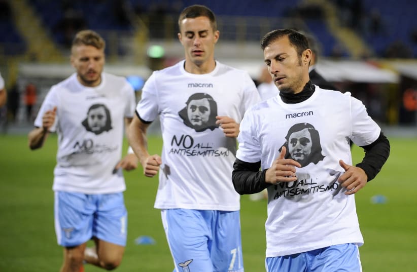 SS Lazio players sport t-shirts with Anne Frank's face on them in an effort to stamp out antisemitism at matches (photo credit: MARCO ROSSI/ GETTY IMAGES)