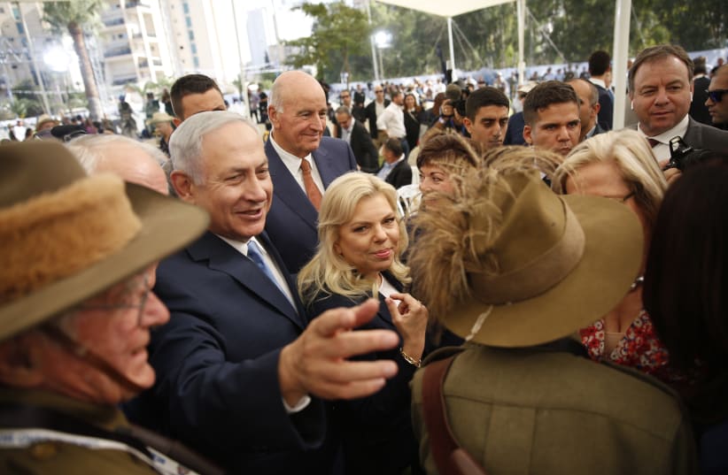 Israeli Prime Minister Benjamin Netanyahu stands next to his Australian counterpart Malcolm Turnbull during a ceremony to commemorate the centennial anniversary of the Battle of Beersheba (photo credit: TOMER APPELBAUM HAARETZ/POOL)