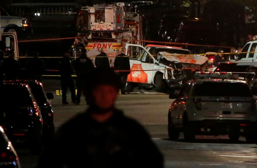 A pickup truck used in an attack sits on the intersection of West and Chambers Street in Manhattan, New York, US, October 31 2017. (photo credit: REUTERS)