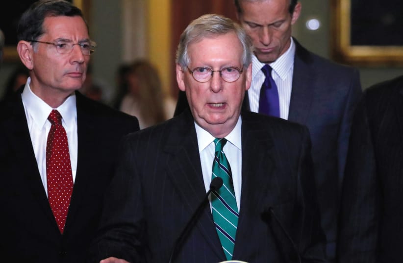 ‘THE REPUBLICAN plan to eliminate federal deductions for state and local taxes is coming under bipartisan fire from lawmakers and citizens in high tax states.’ (photo credit: REUTERS)