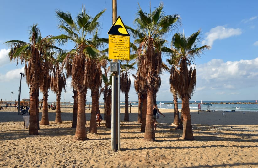 Tsunami warning sign on a Tel Aviv beach. (photo credit: ARIEL HERMONI / DEFENSE MINISTRY)