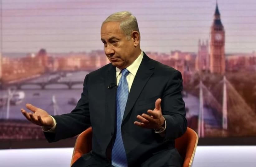 Prime Minister Benjamin Netanyahu is seen speaking on the BBC's Andrew Marr Show in this photograph received via the BBC in London, Britain November 5, 2017. (photo credit: JEFF OVERS/BBC/HANDOUT VIA REUTERS)