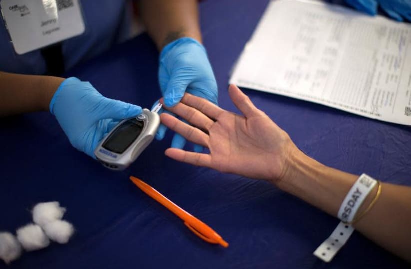 A person recieves a test for diabetes, illustrative (photo credit: REUTERS)