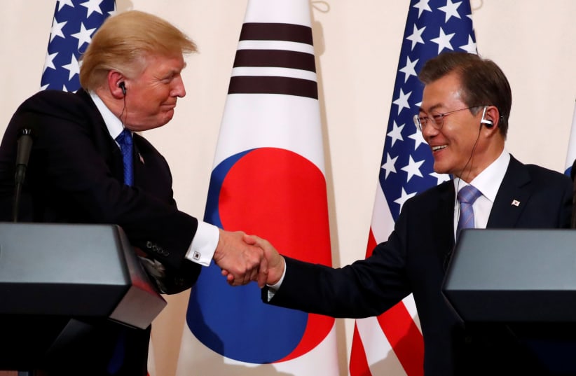 Trump meets with South Korean president Moon Jae-in on second stop of his five-country trip to Asia (photo credit: JONATHAN ERNST / REUTERS)