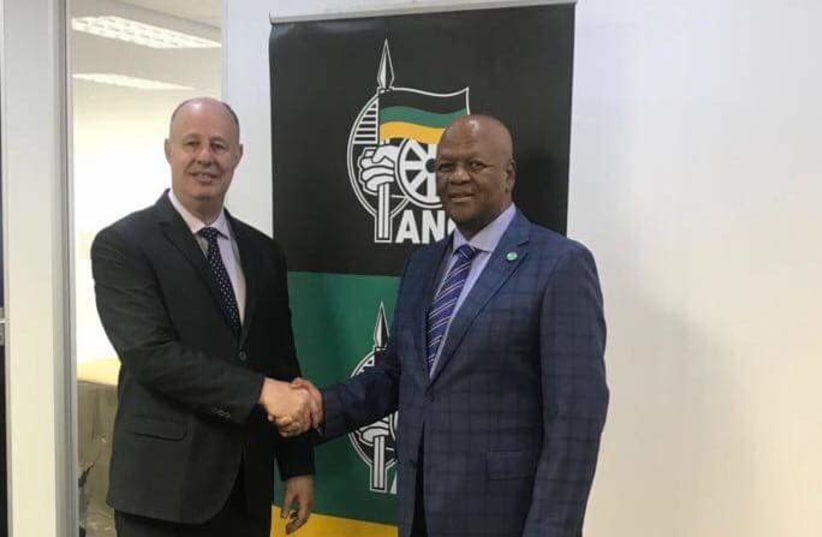 Regional Cooperations Minister Tzachi Hanegbi meets yesterday withJeff Radebe, Minister in the South African presidential office in Johannesburg, South Africa. (Facebook) (photo credit: FACEBOOK)