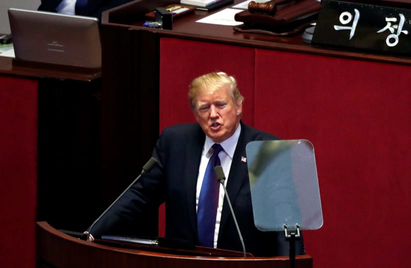 US President Donald Trump speaks at the South Korean National Assembly in Seoul, South Korea, November 8, 2017 (photo credit: REUTERS / JONATHAN ERNST)