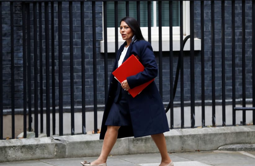 Priti Patel, Britain's Secretary of State for International Development arrives in Downing Street, in London. (photo credit: REUTERS)