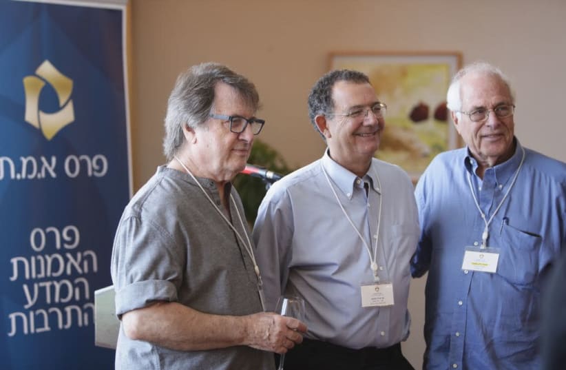 ARIE DUBSON (center), A.M.N Foundation general manager, poses with two of this year's EMET Prize winners, Oded Kotler (left) and Zelig Eshhar (right). (photo credit: EMET PRIZE)