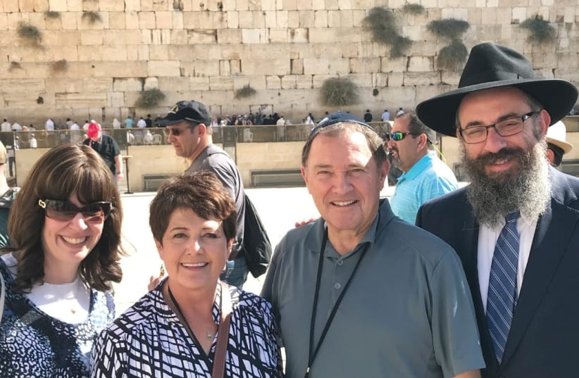 During a recent trade mission, Rabbi Benny Zippel (right), his wife Sharonne (left), Utah Governer Gary Herbert and his wife, Jeannette, visit the Kotel. (photo credit: Courtesy)