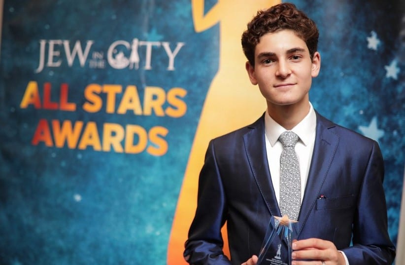 David Mazouz receives an award at Jew in the City's 2017 Orthodox All Stars event. (photo credit: DAVID MILLER)