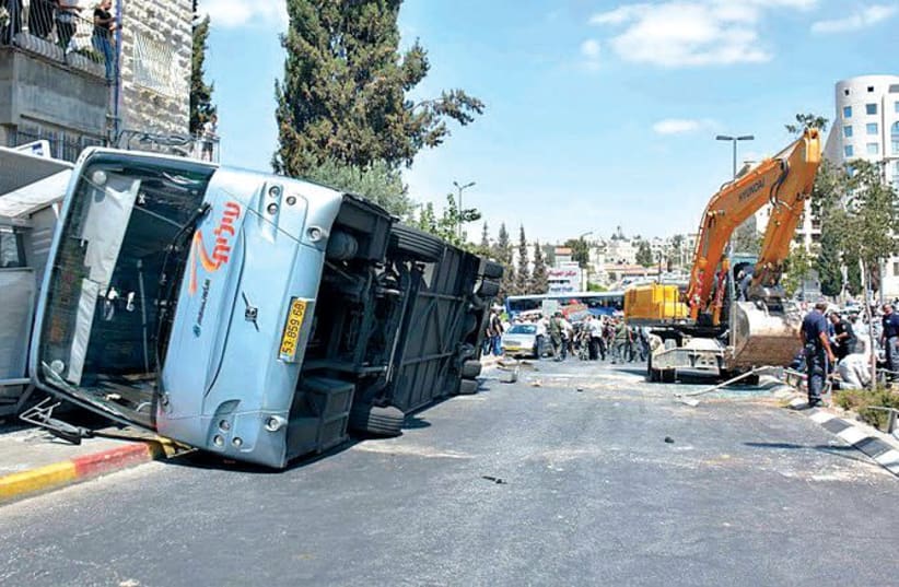Bus flipped by tractor in Jerusalem terror attack. (photo credit: Wikimedia Commons)