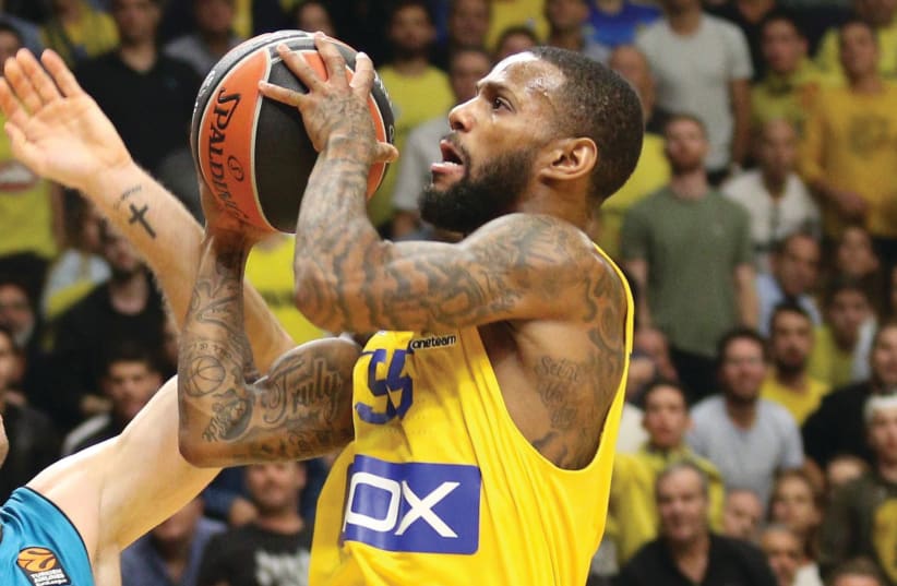 Maccabi Tel Aviv guard Pierre Jackson led his team with 19 points in last night’s 77-69 victory at Khimki Moscow in Euroleague action. The yellow-and-blue improved to a 5-3 record.  (photo credit: ADI AVISHAI)
