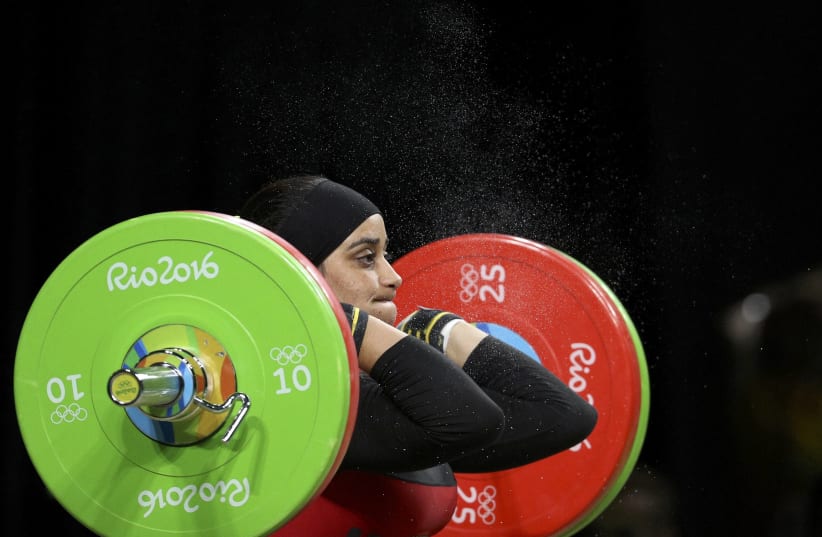 Samira Ouass (MAR) of Morocco competes in the Women's 75kg Rio 2016 Olympics Weightlifting Final (photo credit: REUTERS)