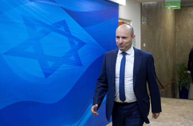 Israeli Education Minister Naftali Bennett arrives to the weekly cabinet meeting at the prime minister office in Jerusalem January 8, 2017.  (photo credit: ABIR SULTAN / REUTERS)