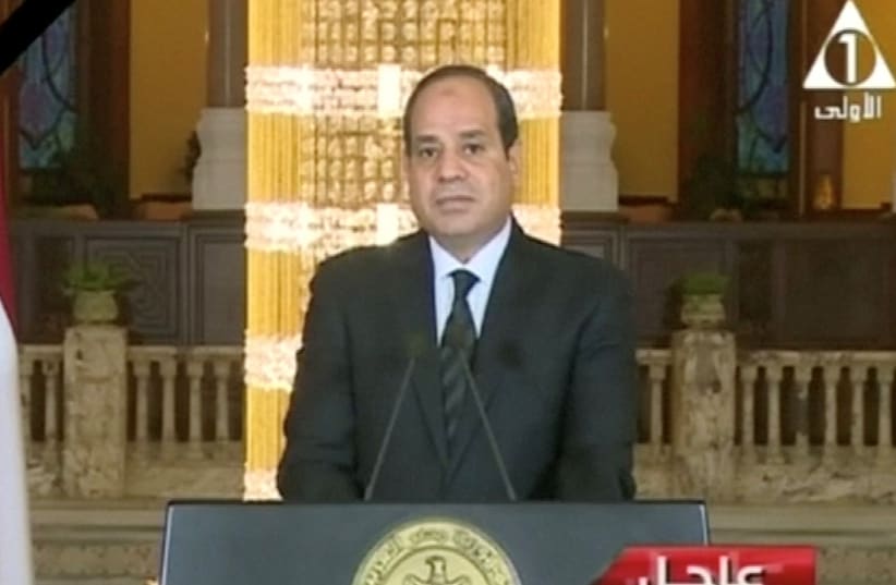 Egyptian President Abdel Fattah Al Sisi gives a televised statement on the attack in North Sinai, in Cairo, Egypt November 24, 2017 (photo credit: EGYPT STATE TV/ VIA REUTERS)
