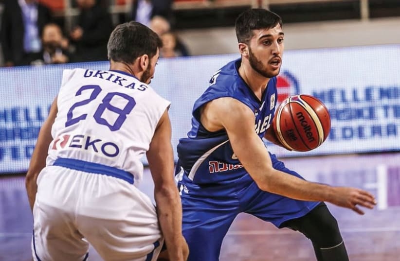 Israel guard Tamir Blatt (right) scored 10 points in last night’s 82-61 defeat to Greece in Crete, but also committed five of the team’s 26 turnovers. (photo credit: FIBA WEBSITE)
