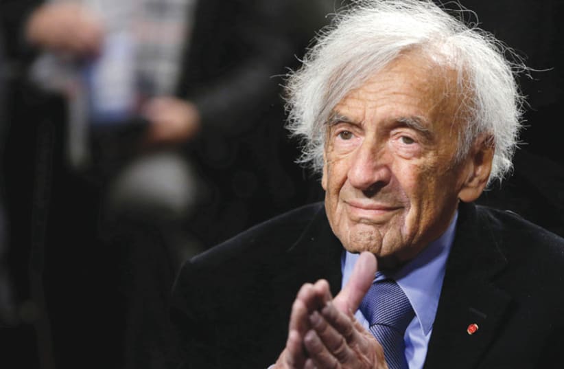 Elie Wiesel participates in a discussion on Capitol Hill in Washington, on March 2, 2015 (photo credit: REUTERS/GARY CAMERON)