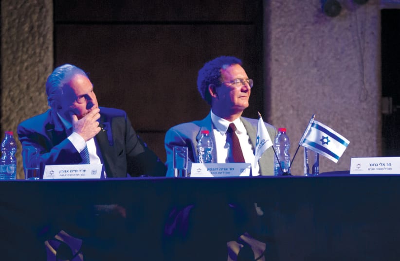 EMET PRIZE COMMITTEE member Jaime Aron (left) sits beside AMN Foundation General Manager Arie Dubson during the Prize ceremony last month (photo credit: OHAD GIGI/ZOOG PRODUCTIONS)