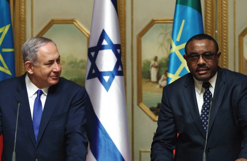 PRIME MINISTER Benjamin Netanyahu and his Ethiopian counterpart Hailemariam Desalegn address a news conference at the National Palace during his State visit to Addis Ababa. (photo credit: REUTERS)