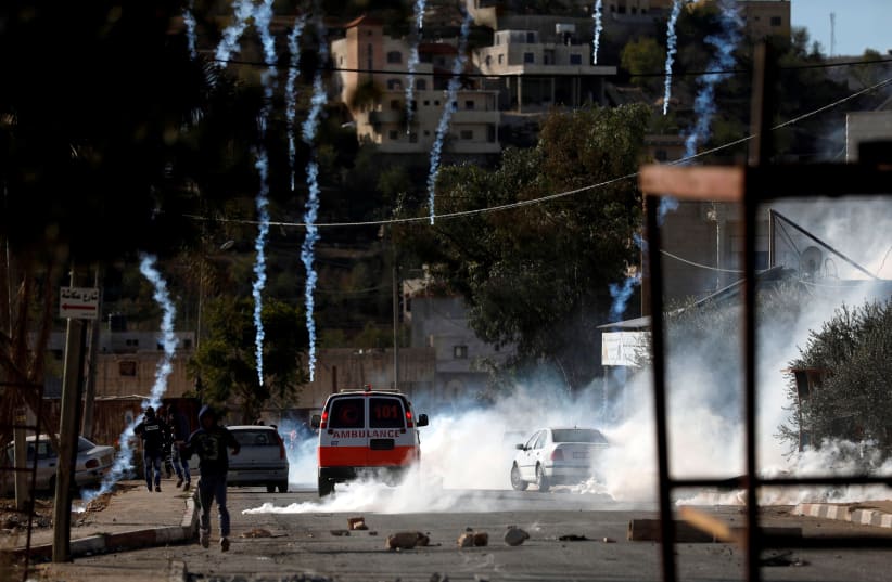 Palestinians clash with Israeli troops in the West Bank village of Kusra (photo credit: MOHAMAD TOROKMAN/REUTERS)