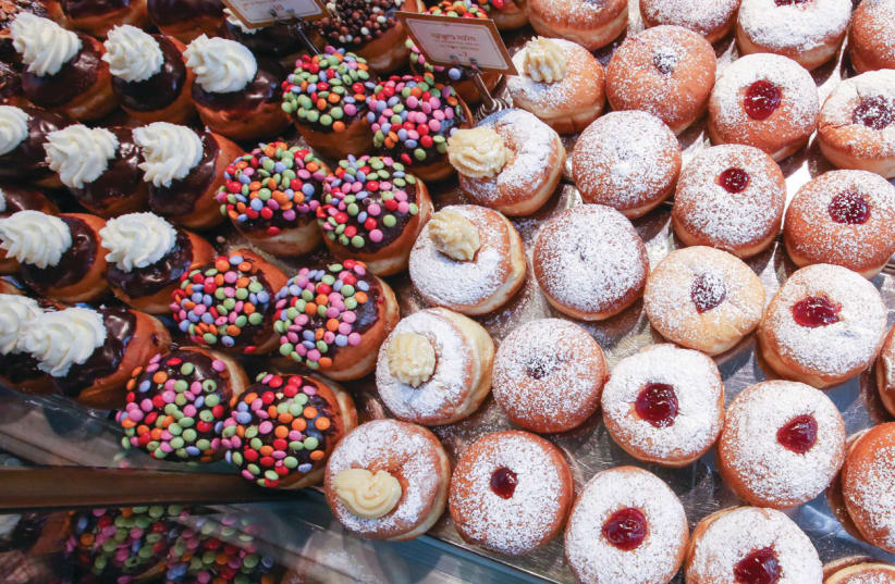 The verdict on Roladin sufganiyot? ‘Fluffy and favorful.’ (photo credit: MARC ISRAEL SELLEM/THE JERUSALEM POST)