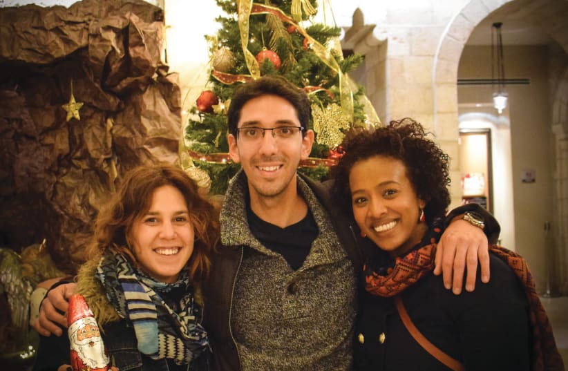 Experiencing different traditions: Open Holidays co-founders (from left) Inbal Halperin, Nir Cohen and Tali Ysia (photo credit: LIORA KOREN)