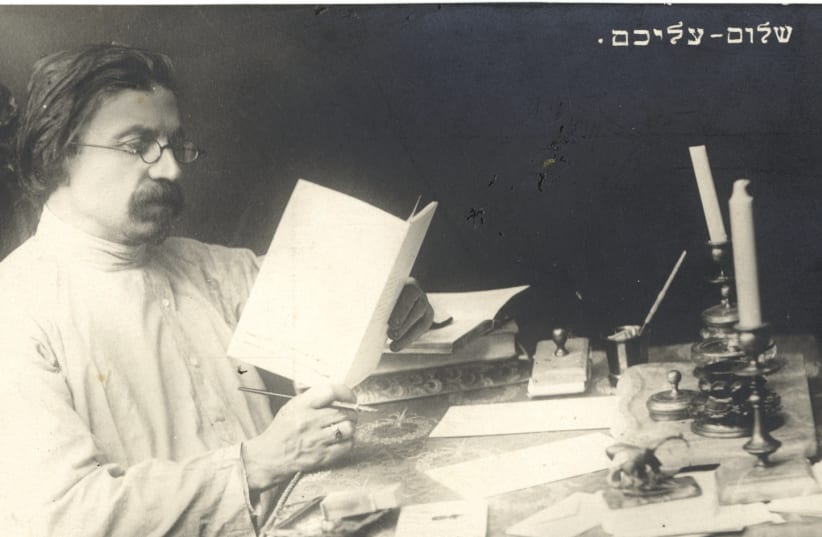 SHOLEM ALEICHEM at his desk in St. Petersburg in 1904 (photo credit: YIVO ARCHIVES)