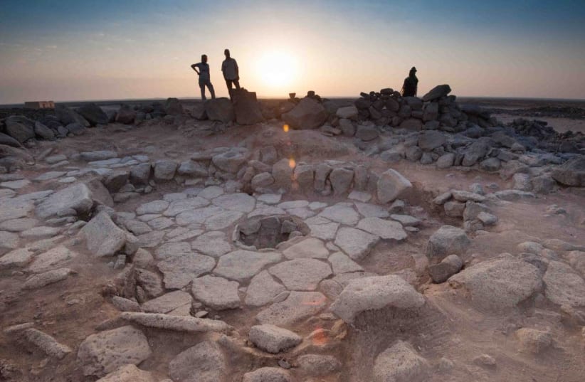 Prof. Elisabetta Boaretto and Dr. Tobias Richter stand near a recently excavated Natufian hearth in Shubayqa, Jordan (photo credit: COURTESY WEITZMAN INSTITUTE OF SCIENCE)