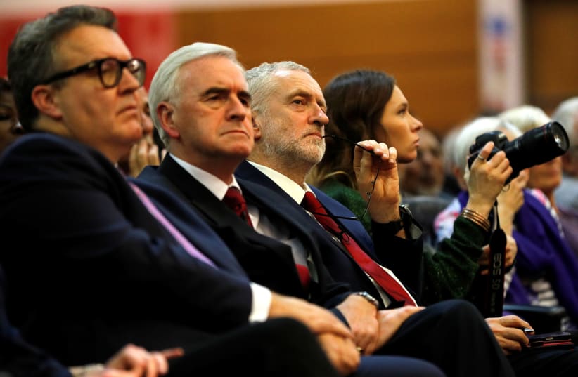 Leader of the opposition Jeremy Corbyn, Shadow Finance Minister John McDonnell and deputy leader of the Labour Party Tom Watson, November 23, 2017 (photo credit: REUTERS)