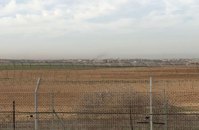 Smoke rises from Gaza following reports of an attack, December 12, 2017 (photo credit: ANNA AHRONHEIM)