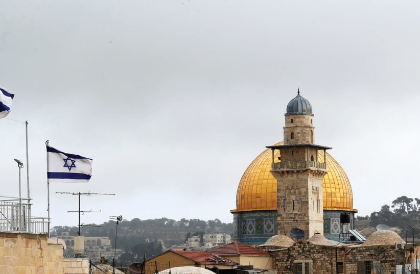 ISRAELI flags flutter next to the Old City (photo credit: REUTERS)