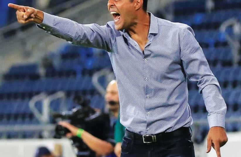 Despite all his efforts, Guy Luzon has become the latest name on the ever-growing list of coaches to have failed to restore Maccabi Haifa to its former glory. (photo credit: ERAN LUF)