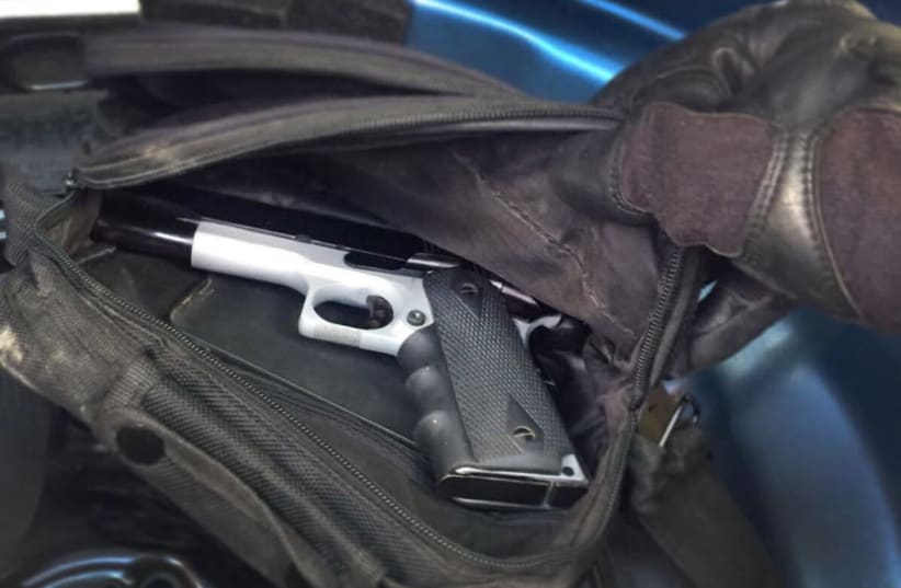 A pistol, belonging to a Hamas cell planning a kidnapping attempt, seized by the Shin Bet (photo credit: SHIN BET)