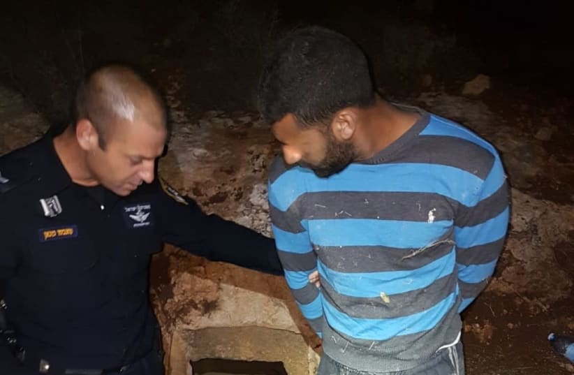 A suspect is arrested for looting a protected archelogical site, December 2017 (photo credit: NIR DISTELFELD/ ISRAEL ANTIQUITIES AUTHORITY)