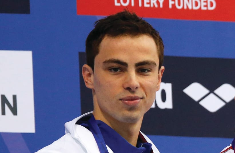 Israeli swimmer Yakov Toumarkin ended the 200-meter backstroke final at the European Short-Course Swimming Championships in Copenhagen yesterday in fourth place. (photo credit: REUTERS)