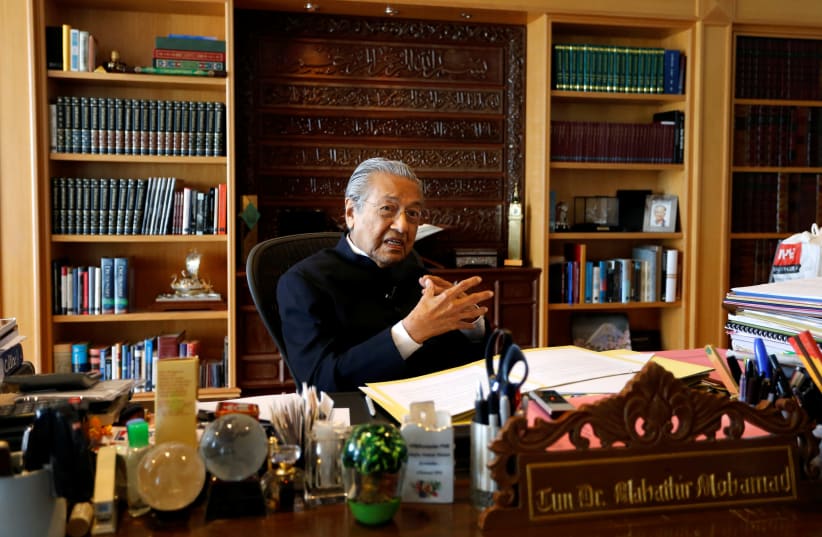 Mahathir Mohamad speaks during an interview in Putrajaya, Malaysia (photo credit: REUTERS)