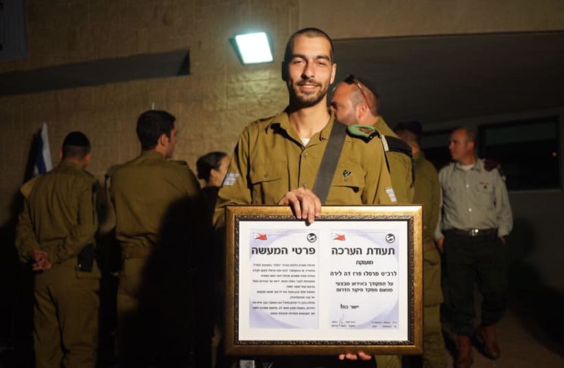Corporal Marcelo Perez wins an award for thwarting a terror attack at Gush Etzion junction. (photo credit: IDF SPOKESMAN’S UNIT)