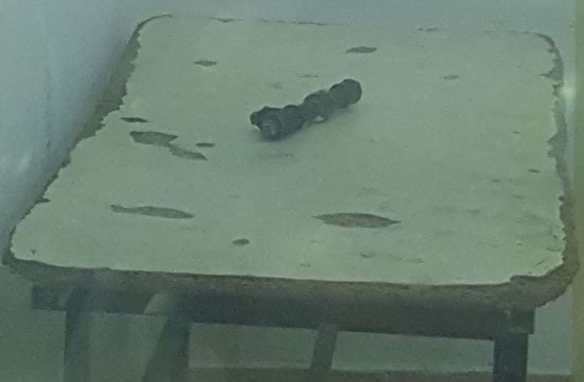 One of two pipe bombs seized and neutralized by police at the entrance to Samaria Military Court in the West Bank. (photo credit: POLICE SPOKESPERSON'S UNIT)