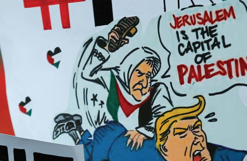 PROTESTERS DEMONSTRATE against US President Donald Trump’s decision to recognize Jerusalem. (photo credit: REUTERS)