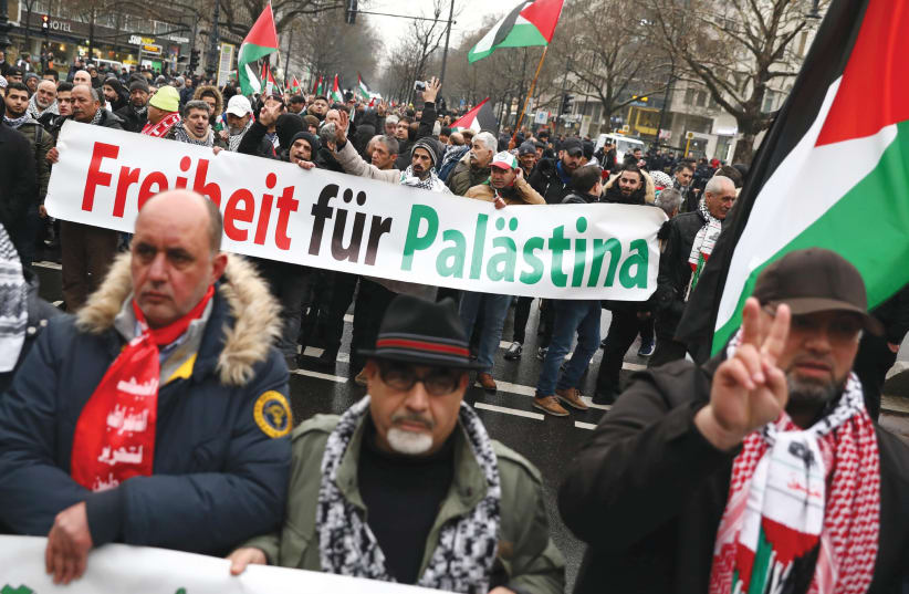 ANTI-ISRAEL PROTESTERS march during a demonstration in Berlin. (photo credit: REUTERS)
