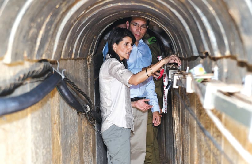 US AMBASSADOR to the United Nations Nikki Haley and Israel’s UN envoy Danny Danon, tour a tunnel in June, excavated by Hamas near the Israeli-Gaza border. (photo credit: MATTY STERN/COURTESY OF U.S. EMBASSY TEL AVIV/VIA REUTERS)