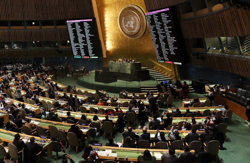 The voting results are displayed on the floor of the United Nations General Assembly in which the United States declaration of Jerusalem as Israel's capital was declared "null and void" on December 21, 2017 in New York City. (photo credit: SPENCER PLATT / GETTY IMAGES NORTH AMERICA / GETTY IMAGES/AFP)
