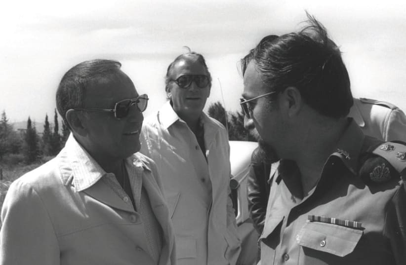 Frank Sinatra (left) and Gregory Peck talk to an IDF officer in Jerusalem in 1978, when he opened the Frank Sinatra Center at the Hebrew University’s Mount Scopus campus (photo credit: MOSHE MILNER / GPO)