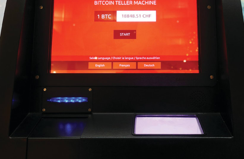 THIS FUNCTIONAL bitcoin ATM was photographed in Zurich (photo credit: REUTERS/ARND WIEGMANN)