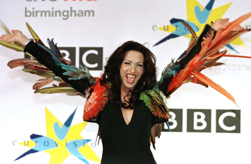 Israel's transsexual Dana International celebrates winning the Eurovision Song contest at the National Indoor Arena in Birmingham, England. (photo credit: REUTERS)