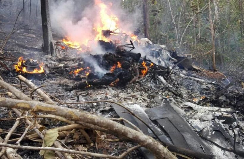 Scene from a plane crash in Costa Rica that killed 10 US citizens, December 2017 (photo credit: MINISTERIO DE SEGURIDAD PUBLICA DE COSTA RICA VIA REUTERS)