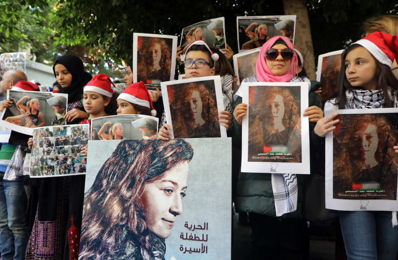 Lebanese and Palestinians gather for a protest calling for the release of Palestinian teen Ahed Tamimi (photo credit: ANWAR AMRO / AFP)