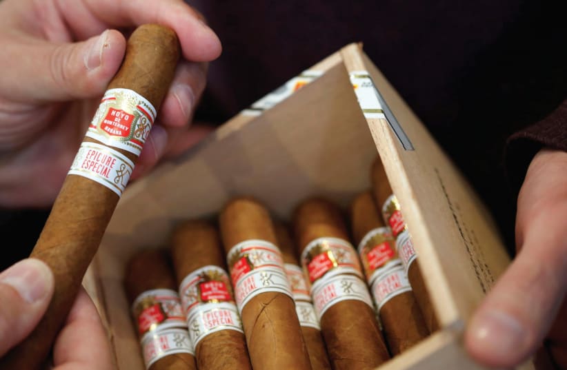 IT ALL starts with a few cigars.  (photo credit: REUTERS)