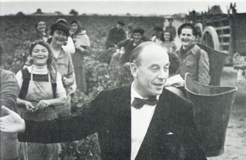 A young Baron Philippe de Rothschild in the vines (photo credit: Courtesy)